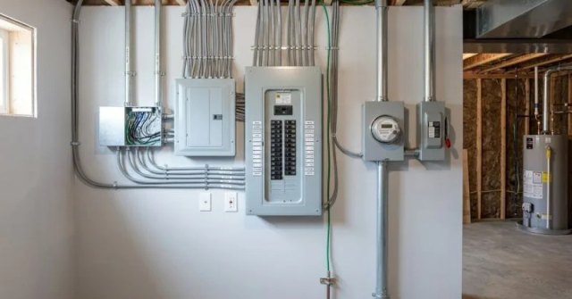 Home electrical panel being examined during an inspection