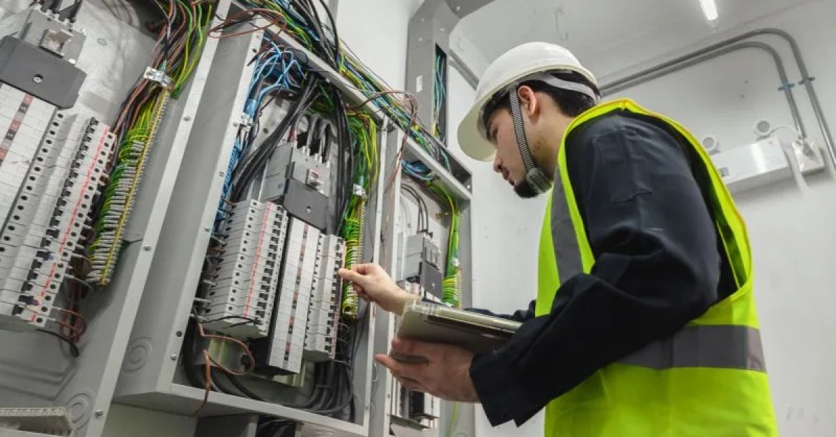 Residential electrical outlet and wall switch under inspection